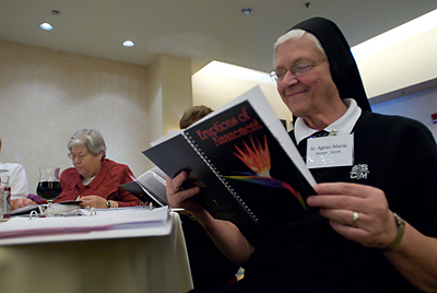Sts. Cyril and Methodius Sister Agnes Marie Winter reads from “Eruptions of Amazement, ” a published collection of writings by women religious in South Carolina, during the fifth annual Statewide Seminar for Women Religious