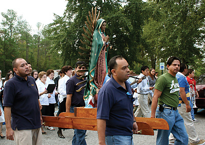 Men carry a statue of Our Lady of Guadalupe at the Diocese of Charleston’s Hispanic Festival, which was held at Our Lady of the Hills Church in Columbia recently