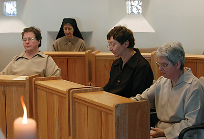 The daily life of Poor Clare sisters revolves around communal and personal prayer. Here, the sisters pray in the monastery chapel.