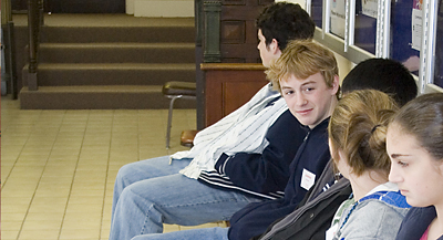 Students wait for confession during the Year of St. Paul pilgrimage in November 2008. The Year for Priests teen pilgrimage will include activities, skits and prayer.