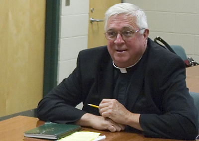 Msgr. Lawrence B. McInerny speaks at Bishop England High School on May 7. He will lead the Lowcountry institution for the 2010-2011 academic year. (Miscellany/Deirdre C. Mays)