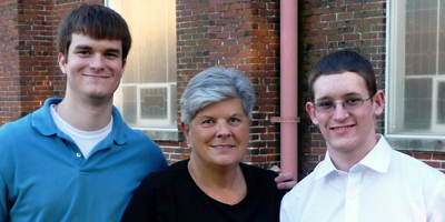 Jane LaMarche, Ph.D., is retiring as diocesan director of campus ministry. She is pictured with College of Charleston students Jon Roebuck and William Epperson. (Provided)
