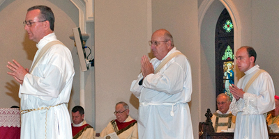 Fathers Philip S. Gillespie, Richard W. Jackson and Artur D. Przywara were ordained at the Cathedral of St. John the Baptist on June 11. (Miscellany/Doug Deas)