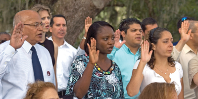 People from many countries take the oath of citizenship of the United States of America July 2 at Middleton Place in Charleston. (Miscellany/Amy Wise Taylor)