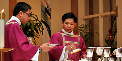 (Miscellany/Christina Lee Knauss) Brothers Noly N. Berjuega and Giovannie B. Nuñez, both of the Clerics Regular Minor, are from the Philippines. They were ordained transitional deacons at Jesus, Our Risen Savior Church in Spartanburg Dec. 12.