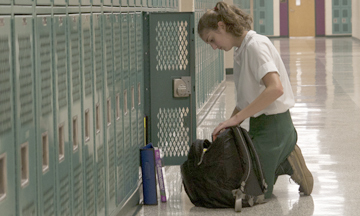 High school girl at locker