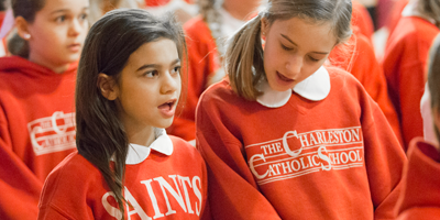 Charleston Catholic School students sing in Mass